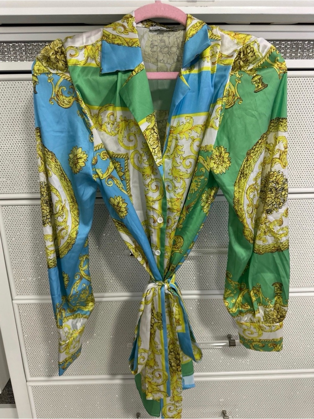 Satin button down front with matching belt for waist